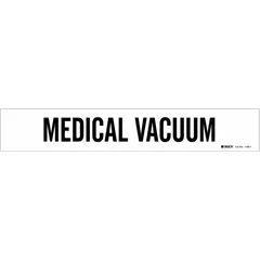 White adhesive pipe marker with black legend reading 'Medical Vacuum'. Fits pipe outer diameters from 2-1/2 to 7-7/8 inches. Supplied without arrows. Used for identification of medical vacuum piping systems.