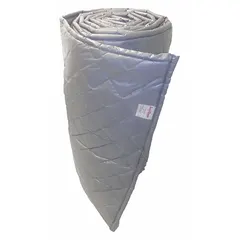 This acoustic wall blanket is a curved panel made of quilted fiberglass, measuring 4 ft wide by 25 ft long and 2 in thick. It is designed for noise reduction in industrial settings such as factories, machine shops, and HVAC rooms.