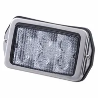 This GROTE LED floodlight provides broad-area illumination for vehicle work lighting. It features a black housing, blunt cut wires for electrical connection, and a removable bracket for flexible mounting. Suitable for universal installation on service trucks, construction equipment, and agricultural machinery