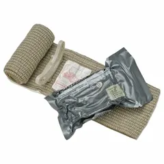 Sterile, latex-free trauma dressing with a 6-inch width and 13 1/2-inch length, made of green cotton. Secured with a clip fastener. Unitized and FDA-compliant. Not water resistant. Used for wound care in medical and first-aid settings.