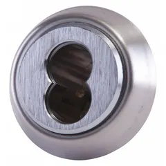Chrome-finished mortise housing for lock assemblies. Accepts 6 to 7 pins and includes a 265 cam. Suitable for commercial door hardware configurations requiring a mortise lock assembly.