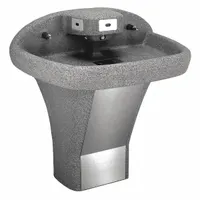 Sensor-operated wash fountain with a D-Shape Corterra bowl in Smoky Granite. Features three stations and a P-Trap drain. ADA compliant. Suitable for high-traffic commercial restrooms, schools, and healthcare facilities