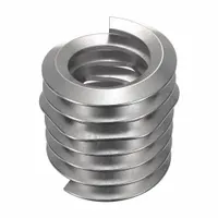 Free-running tangless helical insert for thread repair or reinforcement in metal substrates. Features 1/4"-20 coarse thread, right-hand direction, plain finish, and 18-8 material with tensile strength of 200,000 to 250,000 psi. Supplied in a 1,000-piece pack