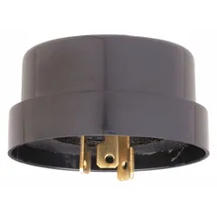 Shorting cap designed to bypass a turn-locking photocell receptacle, enabling continuous operation of a lighting fixture. Fits standard twist-lock photocell mounts for use in industrial and commercial lighting systems requiring constant-on mode.