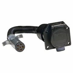 Plastic trailer wiring adapter with a 7-way blade configuration. Converts a 6-way round connector to a 7-way blade for electrical compatibility in towing and vehicle lighting systems.