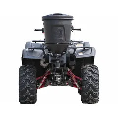 Broadcast spreader for ATV hitch mounting, powered by vehicle battery. Gravity-fed mechanism distributes granular materials such as seed, fertilizer, or salt. Constructed with steel and poly materials.