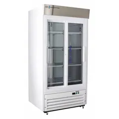 Upright pharmacy refrigerator with 33 cu ft capacity, maintaining 2°C to 7°C. Features a sliding glass door, white finish, and temperature alarm. Uses R-290 refrigerant. Overall depth 33 1/4 in. Suitable for storing temperature-sensitive medications and vaccines in clinical settings.