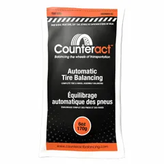 Orange glass beads for dynamic wheel balancing on trucks. The 6 oz container of beads automatically distributes to counteract imbalance during rotation, reducing vibration and tire wear. Suitable for use in truck tire and wheel maintenance.