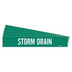 Green adhesive pipe marker with white 'Storm Drain' legend, without arrows. Fits pipe outer diameters from 2-1/2 to 7-7/8 inches. Supplied in a pack of 5 markers for identifying storm drain piping in industrial and commercial facilities.