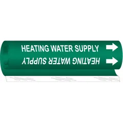Green wrap-around pipe marker with white legend reading 'Heating Water Supply'. Fits pipe outer diameters from 2-1/2 to 7-7/8 inches. Includes directional arrows. Used to identify heating water supply lines in piping systems.