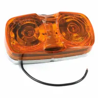 Rectangular amber incandescent clearance light with screw mount and blunt cut wire connection. SAE lens code PC. Used on trucks, trailers, and heavy equipment for side and rear marking to indicate vehicle width and height