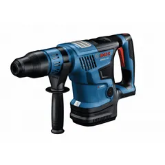 This cordless rotary hammer operates on 18V DC and delivers 5.2 ft-lb of impact energy. It features an SDS-Max shank and accepts bits up to 1 9/16 in diameter. Supplied as a bare tool, it is used for drilling and chiseling in concrete, masonry, and stone, including anchor installation and demolition work.
