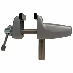 Aluminum vise head with smooth nylon jaw inserts. Jaw face width 2-1/2 in, maximum jaw opening 2-1/4 in. Used for holding workpieces during drilling, tapping, assembly, and inspection. Nylon jaws protect delicate surfaces from marring.