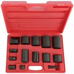 This carbon steel adapter set is designed for press-fitting upper and lower ball joints on universal vehicle makes and models. It is intended for use with a spanner and includes a blow-molded case for storage. Suitable for automotive suspension service.