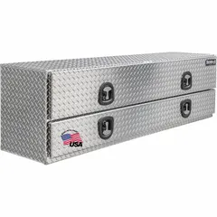 This topside box features dual flip-up drop-down doors for easy access to stored items. It is equipped with a T-Handle compression latch and a keyed lock for security. Finished in silver, the box has an overall width of 90 inches. Suitable for mounting on truck beds to organize tools and equipment.