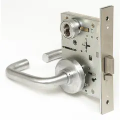 This BEST storeroom lever lockset features a satin chromium-plated stainless steel finish and a 40H rose style. It is ADA compliant and uses an interchangeable core. The ANSI F07 function allows keyed entry from outside and free egress from inside, suitable for commercial interior doors requiring security and accessibility.