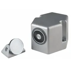 Floor-mounted electromagnetic door holder constructed of aluminum. Fail-safe operation releases the door upon power loss. Used to hold fire-rated doors open in commercial and industrial facilities.