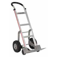 This MAGLINER hand truck features a flow-back frame and pneumatic tires for shock absorption on uneven surfaces. The silver aluminum construction provides strength while reducing weight. With a 48-inch handle height and 500 lb capacity, it is suited for moving loads in warehouses, delivery, and industrial settings.