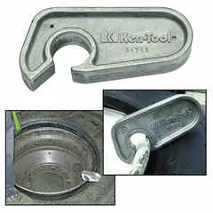 Aluminum bead holder for agriculture and truck tires. Used in tire service to hold tire beads in place during mounting or repair. Resists corrosion for heavy-duty applications.