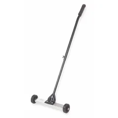 This push-type magnetic sweeper collects ferrous debris such as nuts, screws, and nails from floors, parking lots, and workshops. It features a 35 lb magnetic pull capacity and a 1 in magnet height. The rubber construction provides durability for industrial and maintenance environments.