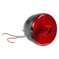 Red incandescent stop light with a round shape and 4 1/4 in overall diameter. Features a permanent bracket mount and pigtail electrical connection. Complies with FMVSS 108 standards. Used on trucks, trailers, and heavy equipment to signal braking