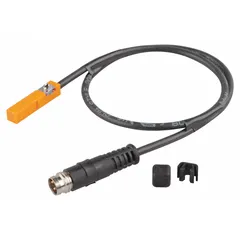T-slot pneumatic cylinder position sensor using GMR technology for non-contact piston position detection. Operates on 10-30V DC supply with 3-wire connection and 1 ft lead length. Provides end-of-stroke or intermediate position feedback in automated machinery and assembly systems.