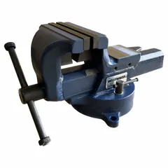 This bench vise features serrated steel jaws for secure clamping of workpieces. With a 5-inch jaw face width, 7-inch maximum jaw opening, and 3-1/4-inch throat depth, it is suited for metalworking, woodworking, and assembly tasks on workbenches.