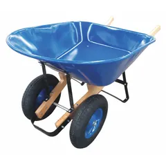 Steel-tray wheelbarrow with a 286 lb maximum load capacity. Equipped with two pneumatic wheels for mobility and hardwood handles. Suitable for transporting soil, gravel, and construction debris on job sites or in landscaping and gardening tasks.