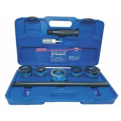 This manual ratcheting pipe threading kit includes four die heads and four dies for cutting right-hand NPT threads on pipes. It is used for on-site threading of pipes in plumbing, construction, and maintenance applications where manual operation is required.