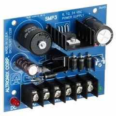 The ALTRONIX SMP3 is a power supply board that converts 16 to 28V AC input to selectable 6, 12, or 24 VDC output at 2.5A. Constructed with phenolic/fiberglass material, it is suitable for use in access control systems, industrial control panels, and automation equipment requiring flexible DC voltage staging.