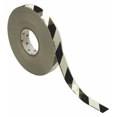 This glow-in-the-dark floor marking tape features a striped black/white pattern for high visibility in normal lighting and photoluminescent glow for low-light or emergency conditions. Made with a 9.4 mil thick polyester backing, it is suitable for marking pathways, exits, and hazards in industrial facilities, warehouses, and plants.