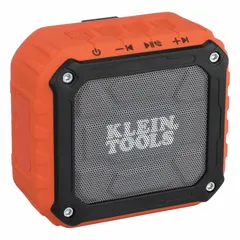 Portable speaker for job sites, supporting auxiliary, Bluetooth, and USB audio input. Operates on 3.7V DC and includes one battery (charger not included). Certified BC, CE, FCC, IC, and IP45 rated for dust and water resistance.