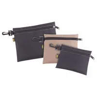 This set includes three flat zippered tool bags made of polyester in a black and tan color scheme. The bags have no inside pockets, providing open storage for hand tools, fasteners, and small parts. Suitable for organizing and transporting tools to job sites or workshops