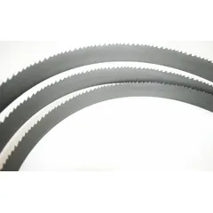Bi-metal band saw blade for cutting aluminum, carbon steel, and soft metals. M42 material construction. Blade width 3/4 in, length 7 ft 9 in, 14 teeth per inch. Suitable for general metal cutting applications in fabrication and maintenance.