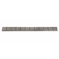 Adhesive wheel weight made of uncoated lead, designed for balancing steel rims on trucks. Attaches via adhesive backing for static and dynamic balancing, reducing vibration and tire wear in heavy-duty commercial applications