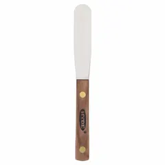 Standard spreading tool with a spring steel blade shaped as a semi-circle and a hardwood handle. Used for applying and smoothing compounds, adhesives, and fillers in construction and maintenance tasks.