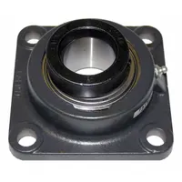 Cast iron 4-bolt flange-mount ball bearing with 1 1/4 in cylindrical bore and eccentric collar locking. Lubricated with NLGI #2 equivalent grease. Mounting bolt size 7/16 in. Overall length 4 5/8 in. Suitable for supporting rotating shafts in conveyors, fans, and material handling equipment