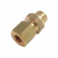Brass compression fitting with standard sleeve, metric x compression type. Connects 20 mm pipe to a 14 mm OD fitting. Used in pneumatic, hydraulic, and lubrication lines for leak-resistant joints