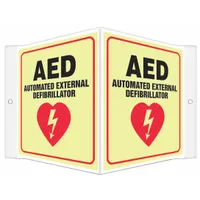 This V-shape projection sign is designed to mark AED locations in facilities. Made of PETG with glow-in-the-dark properties, it remains visible in low-light conditions. The sign features mounting holes for installation and has a nominal size of 6 in x 8-1/2 in. It is not retroreflective and has no anti-slip surface