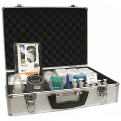 Hydraulic fluid tester kit for on-site oil analysis. Includes reagents to check contamination or degradation. Measures 3 inches wide by 4 3/8 inches high. Suitable for portable fluid condition checks in hydraulic systems.