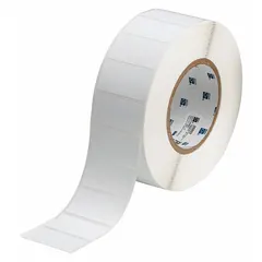 White matte destructible tamper-indicating precut label roll, 1 in x 2 in, with 1 in core. Contains 3,000 labels per roll. Compatible with Brady IP Series printers. Designed for asset identification and security marking where tamper evidence is required.