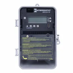 Digital timer switch with a plastic body for outdoor surface mounting. Operates on a 24-hour schedule at 120-277V AC with DPST/SPST switching. Suitable for controlling lighting, signage, or pumps in outdoor commercial or industrial applications.