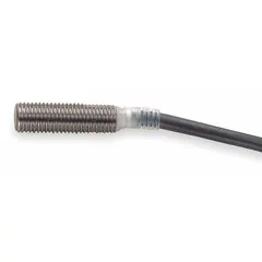 OMRON E2E-X3D1S is a shielded inductive proximity sensor with a normally open output. It operates on 10-30V DC and has a 2-wire non-terminated cable. This sensor is used for non-contact detection of metal objects in industrial automation applications such as manufacturing lines, packaging machinery, and conveyor systems.