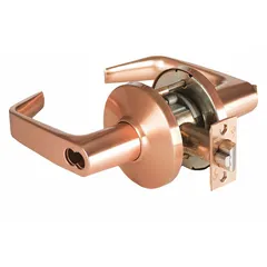 Office lever lockset with 9K Contour Angle Return Lever in satin bronze, clear coated zinc. ADA compliant and equipped with Large Format Interchangeable Core (LFIC) for key control and rekeying flexibility. F109 function suitable for interior doors in commercial settings such as offices, schools, and hospitals.