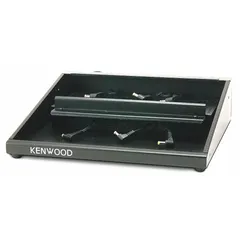The KENWOOD KMB-28-AK is a multi-unit adapter designed to charge up to six NX-P1000 series radios simultaneously from a 120 V AC power source. It is used in settings where multiple radios need to be kept ready for operations, such as fleet management, security teams, or industrial facilities.
