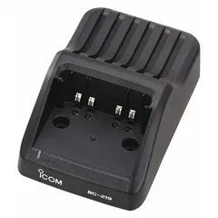 Single unit charger for ICOM F3400D, F52D, and F7010 series radios. Operates on 220 V AC input and charges one radio at a time. Suitable for desktop charging in communication fleets.