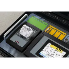 This battery-powered scale indicator displays weight in pounds. It measures 1 1/2 ft in length and 1 ft in width. CSA certified for industrial weighing applications. Suitable for use in material handling environments where portable weight display is required.