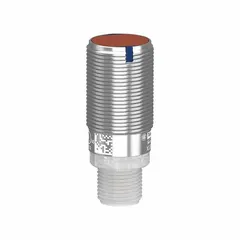 M18 threaded cylindrical transmitter with built-in 4-pin M12 connector. Operates on 12-24V DC supply voltage. Used in photoelectric sensing systems to emit a light beam for non-contact object detection in industrial automation, packaging, and material handling applications.