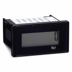 Panel-mount hour meter with rectangular bezel, LCD display, and push-button reset. Measures 1 1/8 in x 2 in, operates at 0 V AC/DC, and carries NEMA 12 enclosure rating with CE compliance. Used to record operating hours of industrial equipment such as generators, pumps, and machinery.