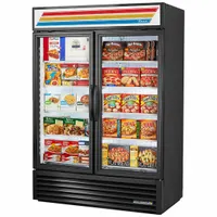 This convertible merchandiser from the GDM series operates as either a refrigerator or freezer, suitable for commercial display and storage of chilled or frozen products. It features a black glass door for product visibility and uses R-290 refrigerant. Dimensions are 78 5/8 x 54 1/8 x 29 7/8 inches